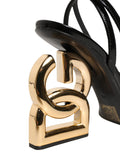 Sandales à talons noires Dolce & Gabbana en cuir avec bride à la cheville, élégantes et sophistiquées.