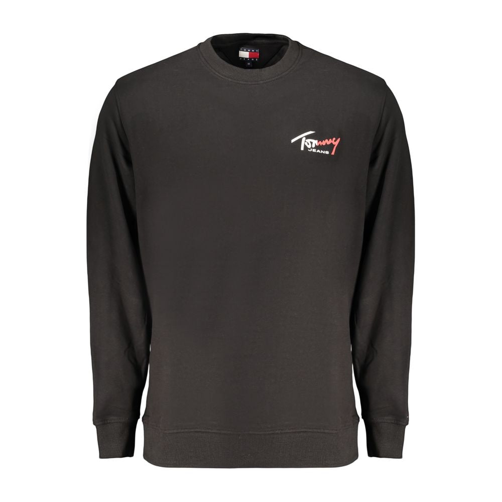 Sweat-shirt homme en coton noir de Tommy Hilfiger, avec logo discret sur la poitrine, porté sur un mannequin.