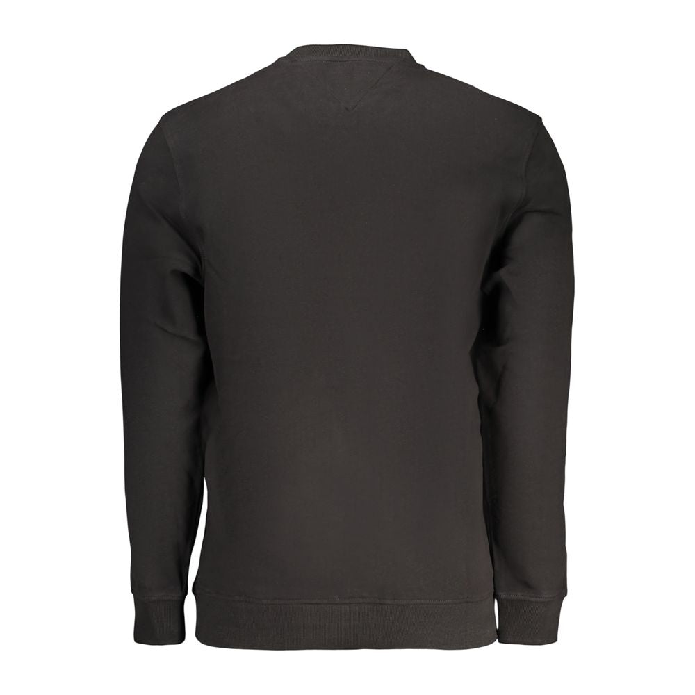 Sweatshirt homme en coton noir de la marque Tommy Hilfiger, avec logo discret sur la poitrine.