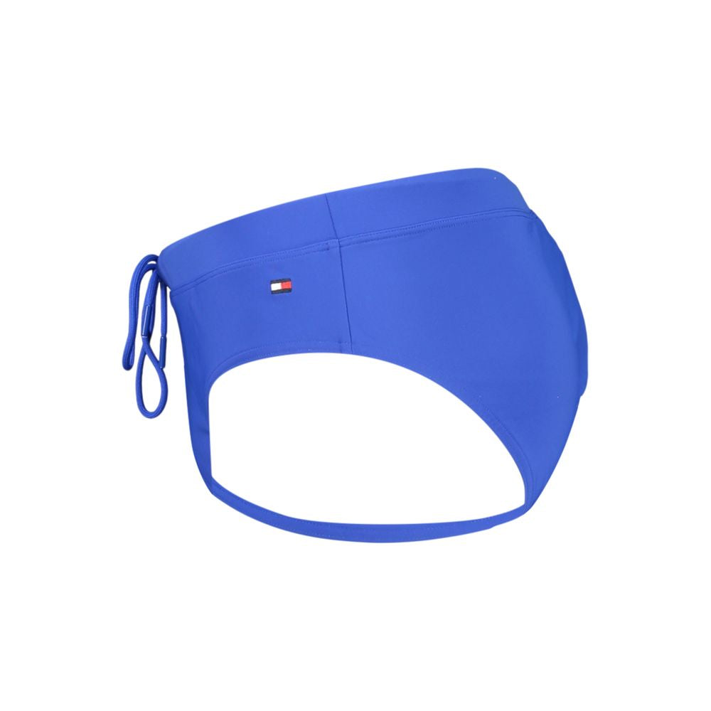 Maillot de bain homme Tommy Hilfiger en polyester bleu, style sportif avec logo visible.