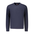 Pull en maille pour homme Tommy Hilfiger en coton bleu, détail de la texture et du col côtelé visible.