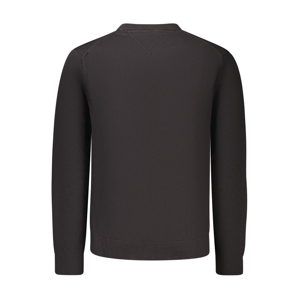 Pull homme Tommy Hilfiger en coton noir, élégant et confortable, avec col rond et logo discret.