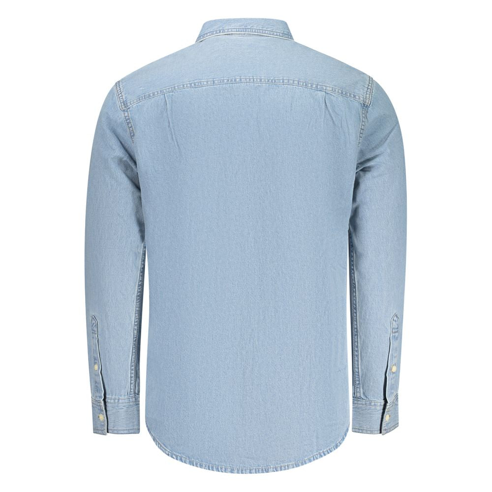 Chemise homme en coton Calvin Klein Azzurro, coupe classique, couleur bleue claire, montrée portée avec col et boutons visibles