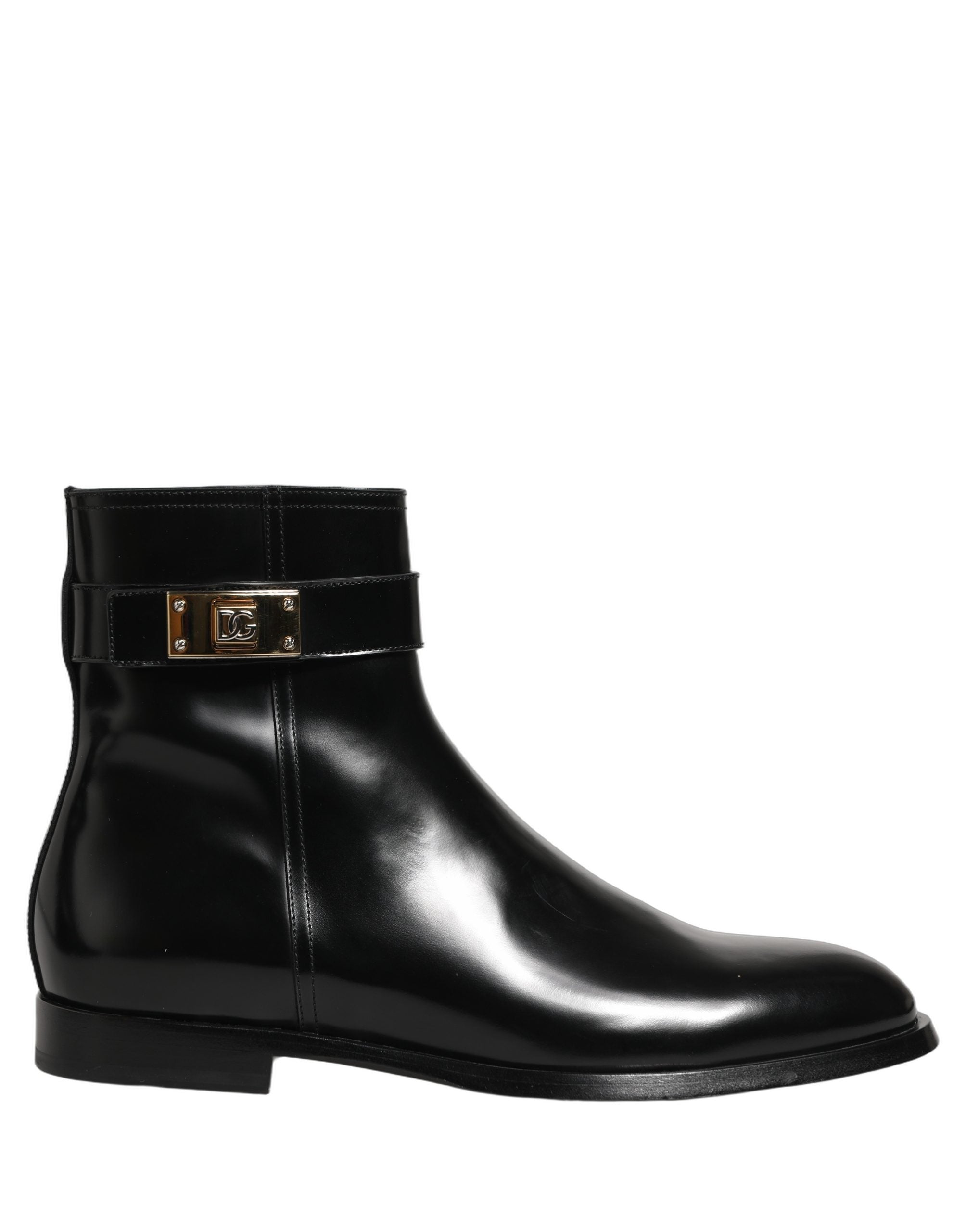 Bottes mi-mollet en cuir noir Dolce & Gabbana avec boucle logo, élégantes et sophistiquées, visibles en gros plan.