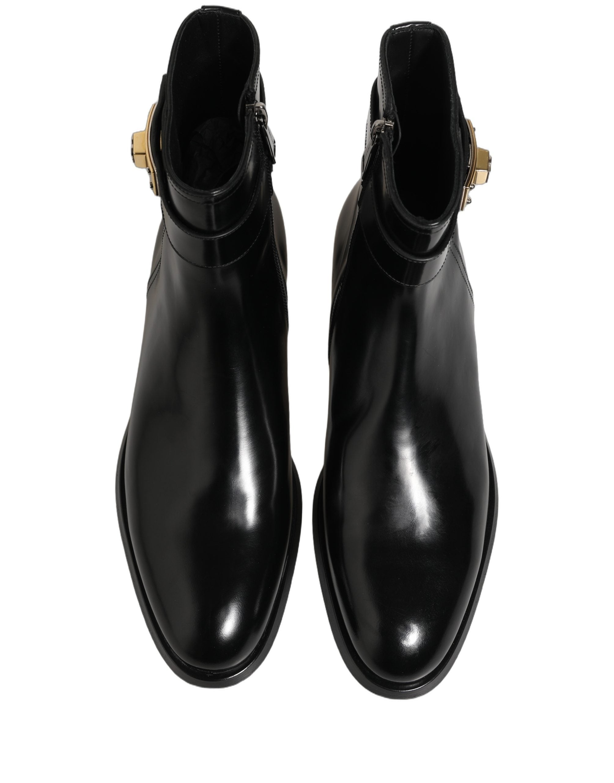 Chaussures Dolce & Gabbana en cuir noir avec boucle logo et mi-mollet, élégantes bottines pour femme.