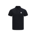 Chemise polo noire en coton de Balmain affichée, avec col classique et logo discret sur la poitrine.
