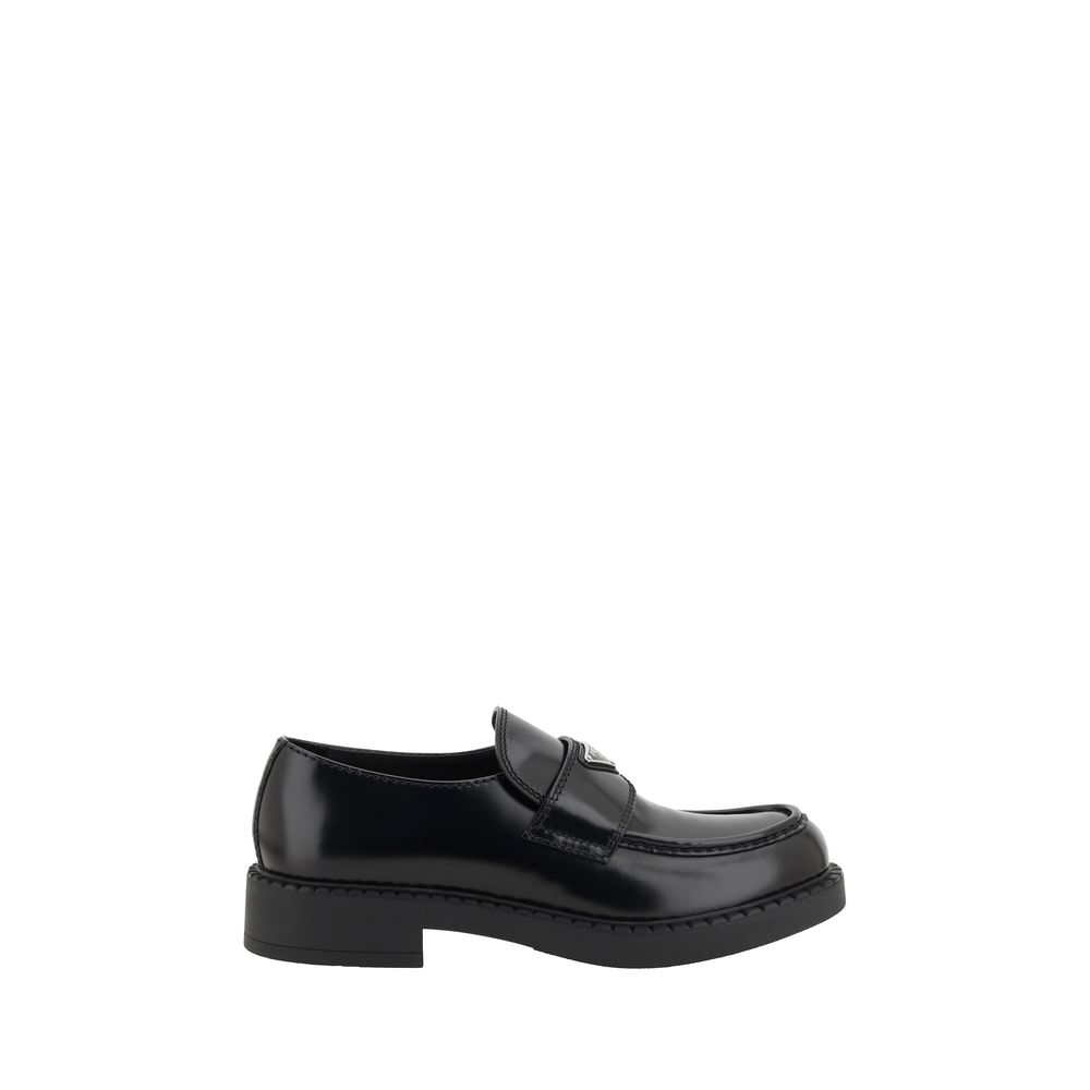 Chaussures Prada Bos Taurus en cuir de veau noir avec plateforme, mocassins élégants et confortables.