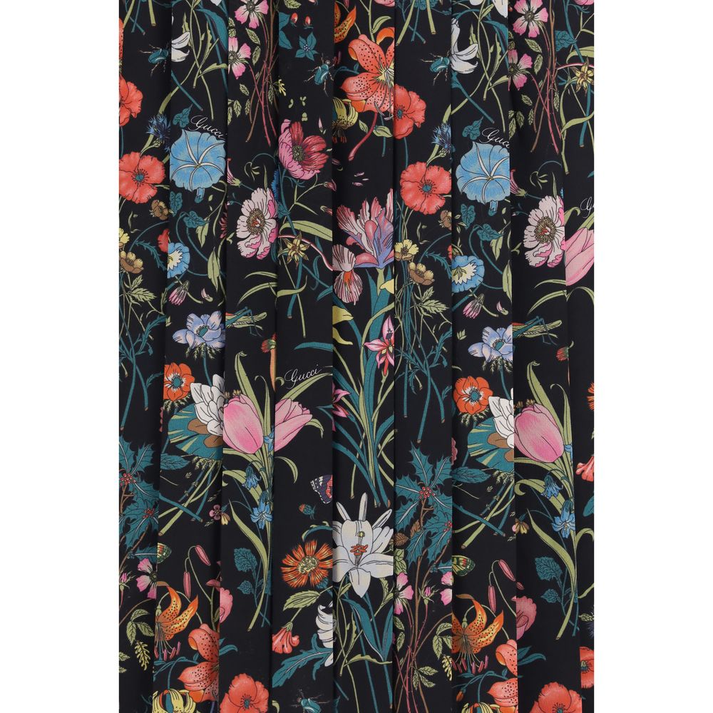 Jupe midi en soie multicolore Gucci, élégante et fluide, avec un motif vibrant et une coupe sophistiquée.
