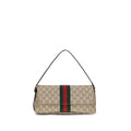Sac à main beige en coton de Gucci, avec détails élégants, idéal pour un style chic et sophistiqué.