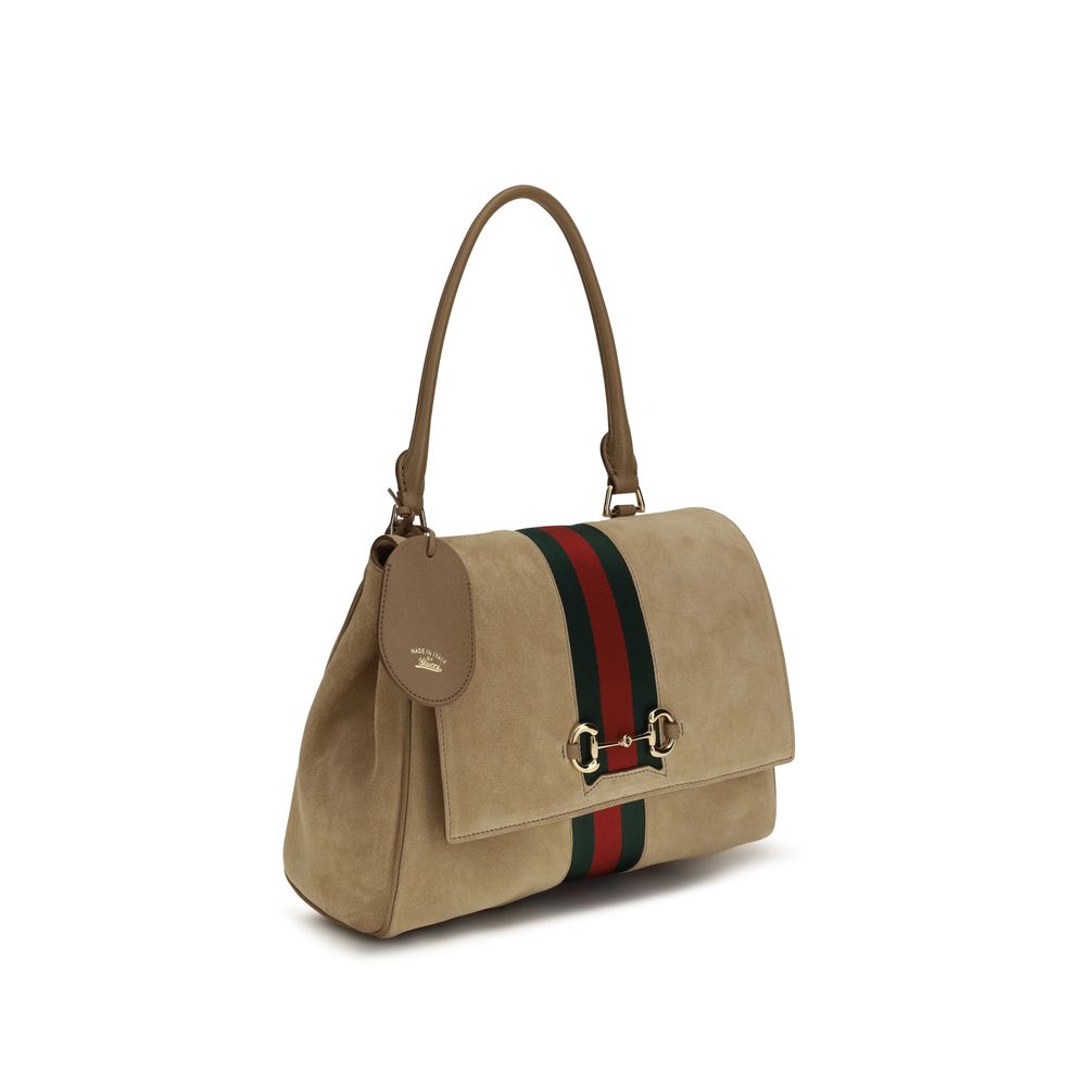 Sac à main Gucci en cuir de veau beige Bos Taurus, élégant et sophistiqué avec détails raffinés.