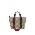 Sac à bandoulière en polyester beige Gucci, avec détails élégants et logo de la marque, visible sur l'image.