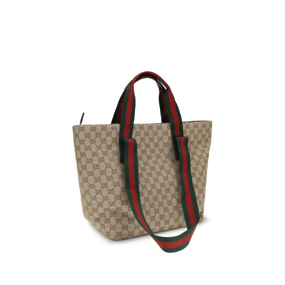 Sac à main Gucci beige en polyester avec bandoulière, vue de face, élégant et pratique.