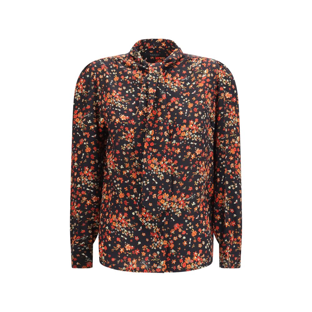 Chemise en soie multicolore Gucci avec motif élégant, détails colorés, manches longues et col classique.