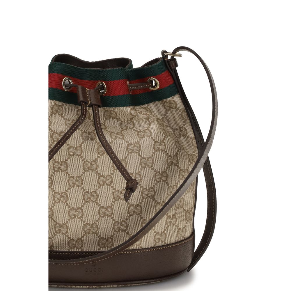 Sac à main en coton beige de Gucci, avec détails élégants et design sophistiqué, visible sur l'image.