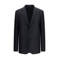 Veste en soie noire de Gucci, élégante et sophistiquée, avec coupe moderne et détails raffinés visibles sur l'image.