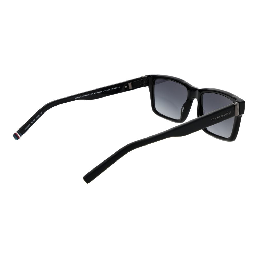 Lunettes de soleil Tommy Hilfiger en acétate noir avec monture élégante et design moderne, visibles sur l'image.