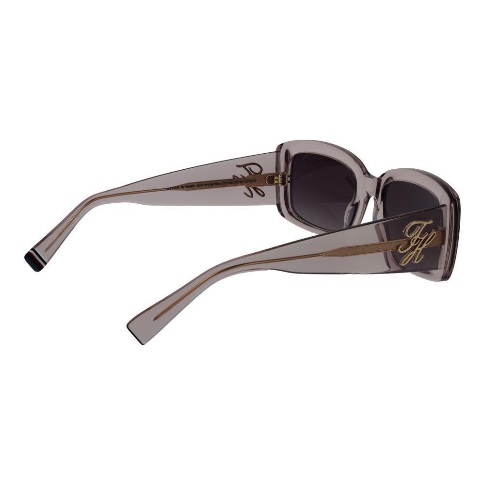 Lunettes de soleil Tommy Hilfiger en acétate gris, avec monture élégante et branches épaisses.