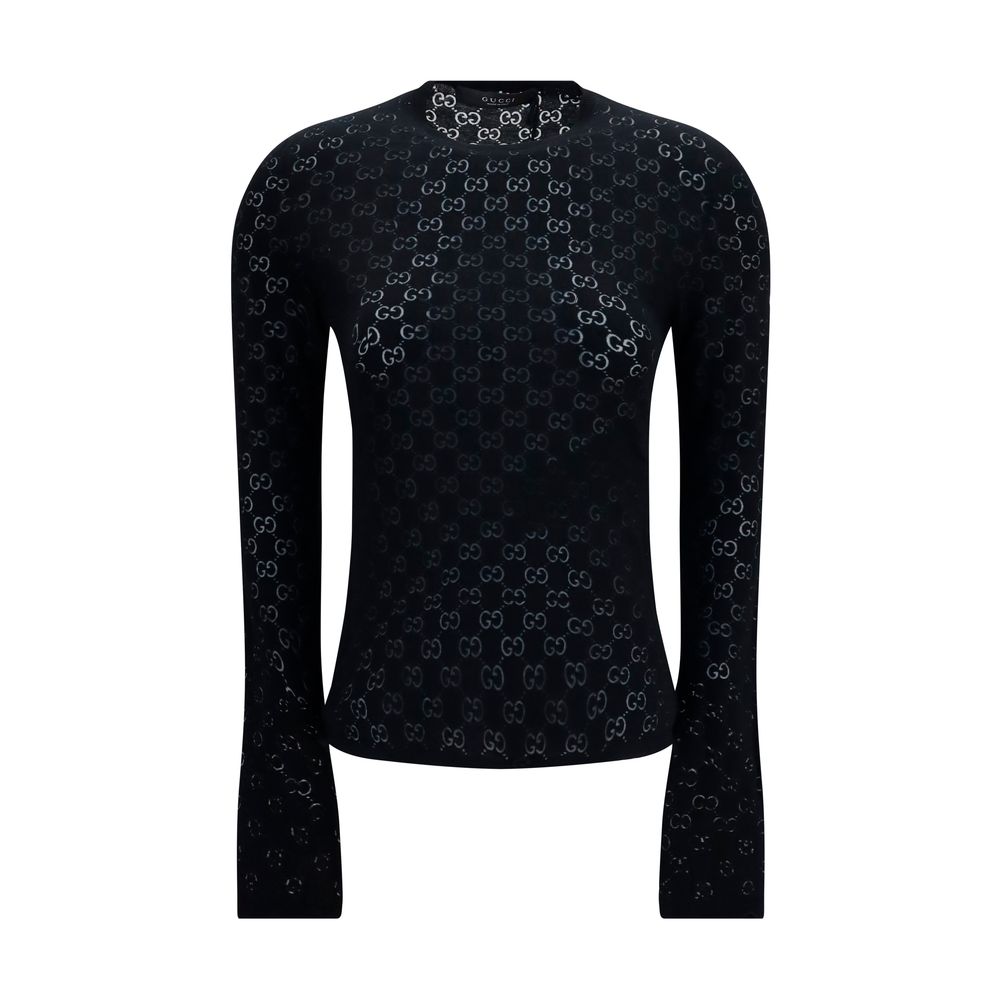 T-shirt en coton noir de Gucci, style décontracté avec logo Gucci visible, porté sur un mannequin.