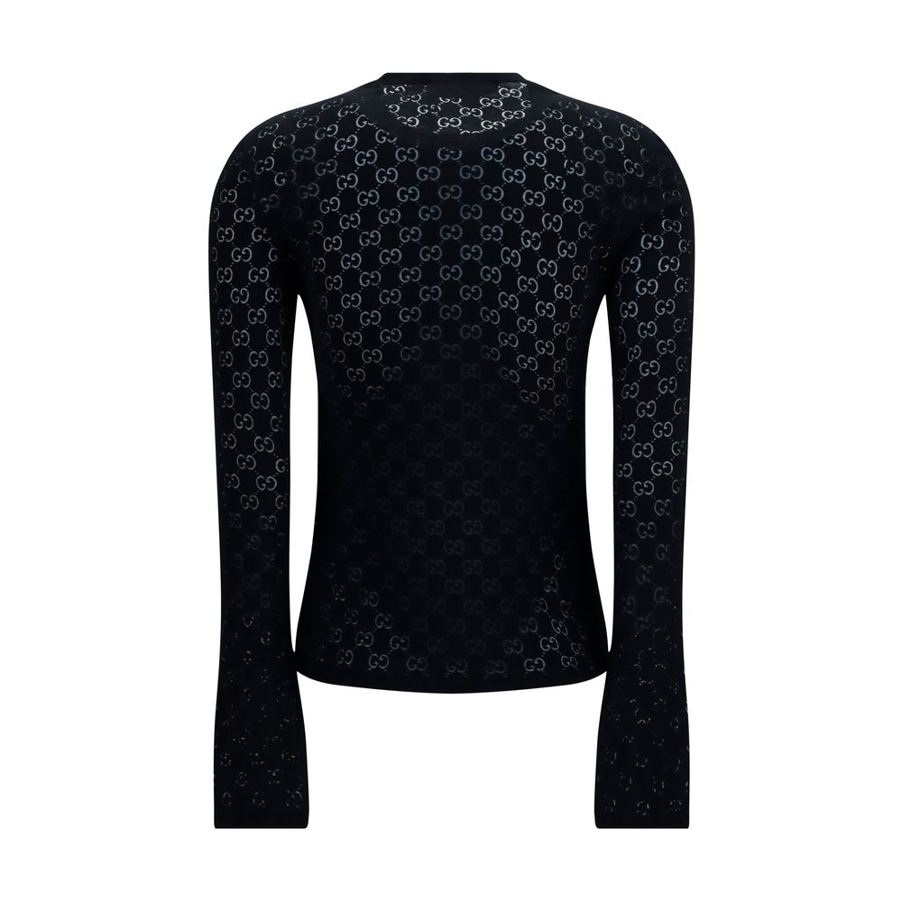 T-shirt en coton noir Gucci pour homme, design classique avec logo Gucci visible sur le devant.