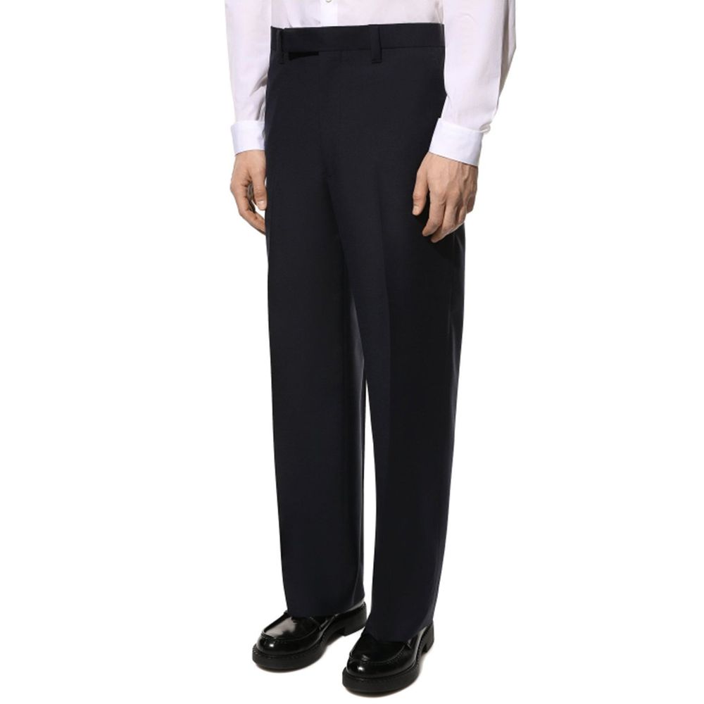 Pantalons en laine bleue Prada pour femme, coupe élégante et classique, parfaits pour une tenue sophistiquée.