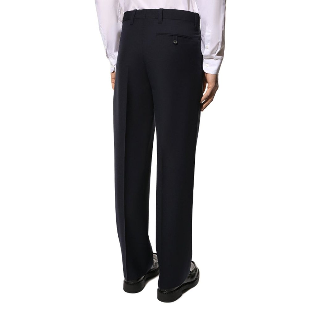 Pantalon en laine bleue de Prada pour femme, coupe élégante et ajustée, visible en gros plan sur fond neutre.