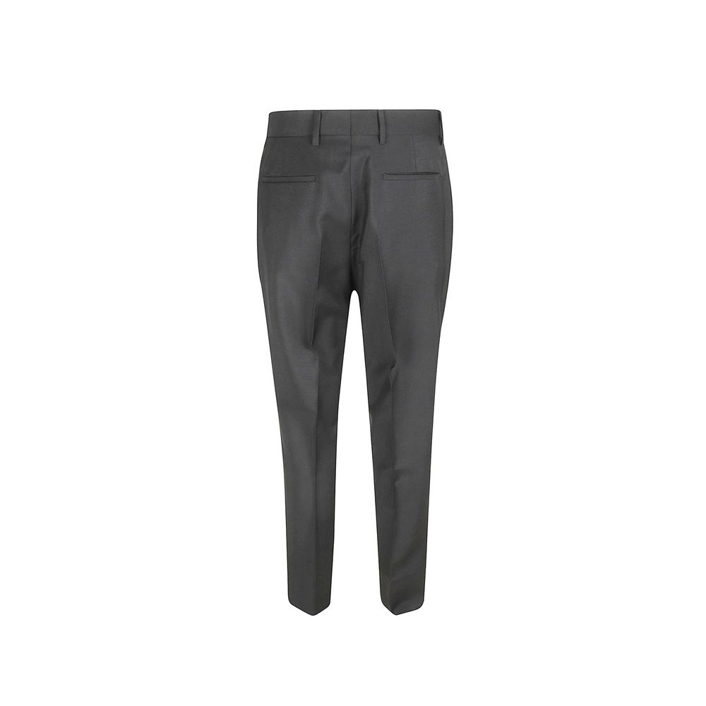 Pantalon en laine gris de Prada pour homme, coupe élégante et tissu de qualité visible sur l'image.