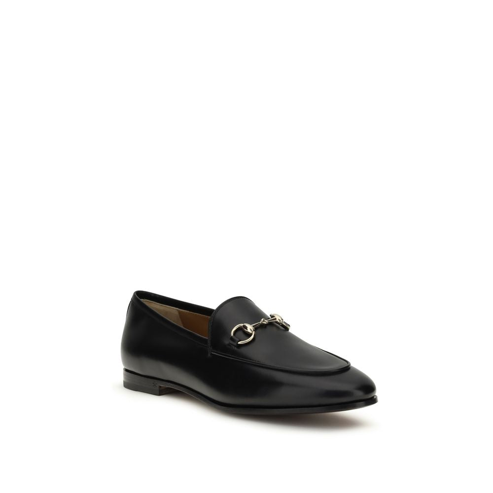 Chaussures Gucci en cuir de veau noir Bos Taurus, mocassins à enfiler élégants pour homme.