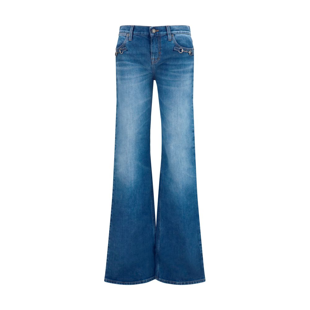 Jeans évasés en coton bleu Gucci, style tendance, avec coupe flared et détails modernes, visibles sur l'image.