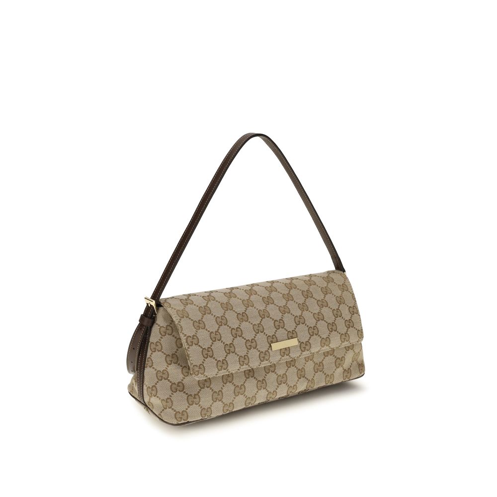 Sac à main en polyester marron de Gucci, élégant et spacieux, avec détails classiques de la marque.