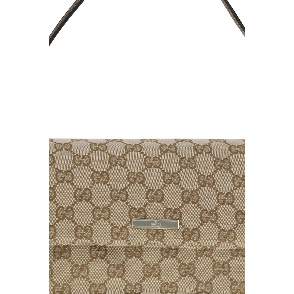Sac à main en polyester marron Gucci, vue de face, avec détails de la poignée et de la fermeture.