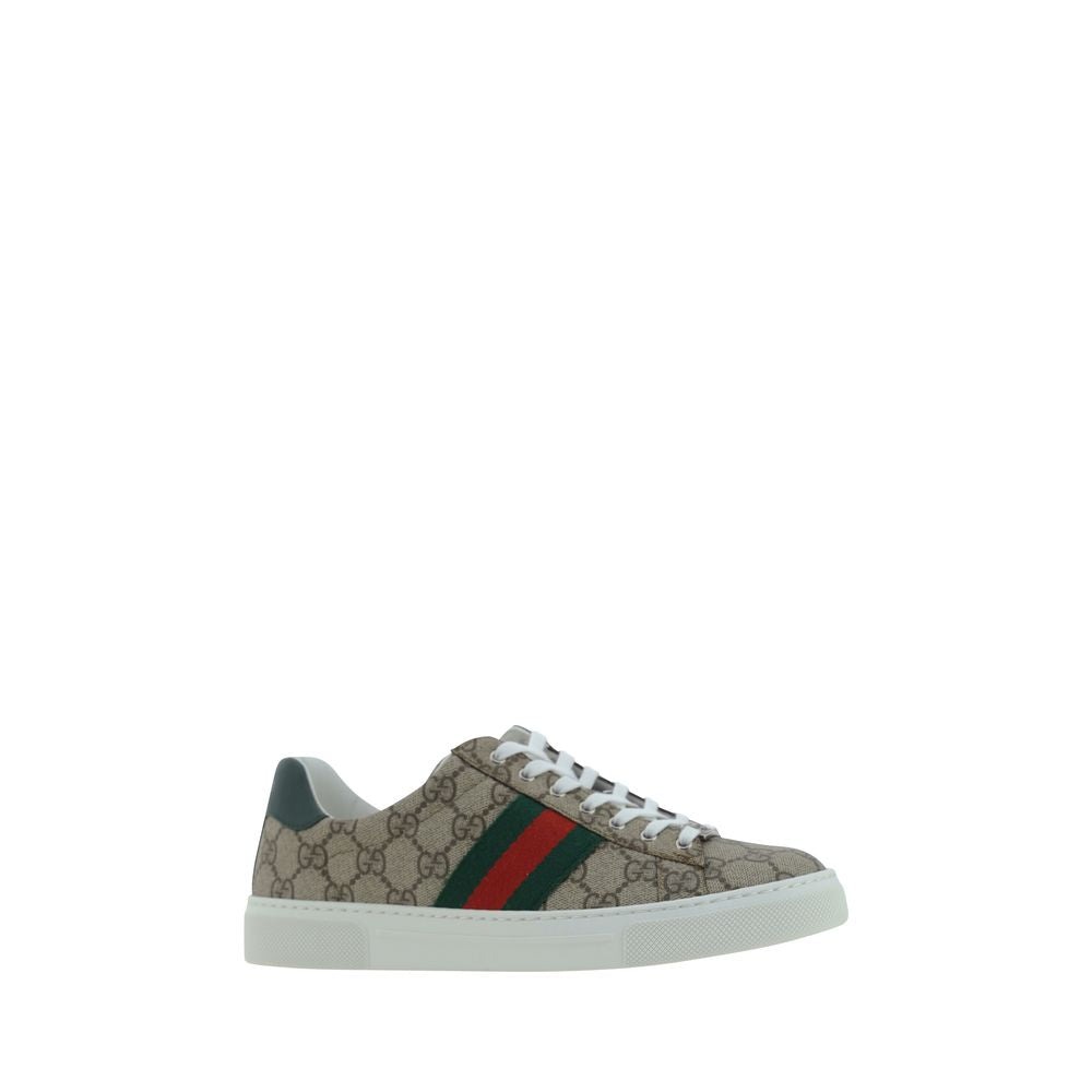 Sneakers plateforme en tissu multicolore Gucci avec logo, vue de face, affichant leur design coloré et moderne.