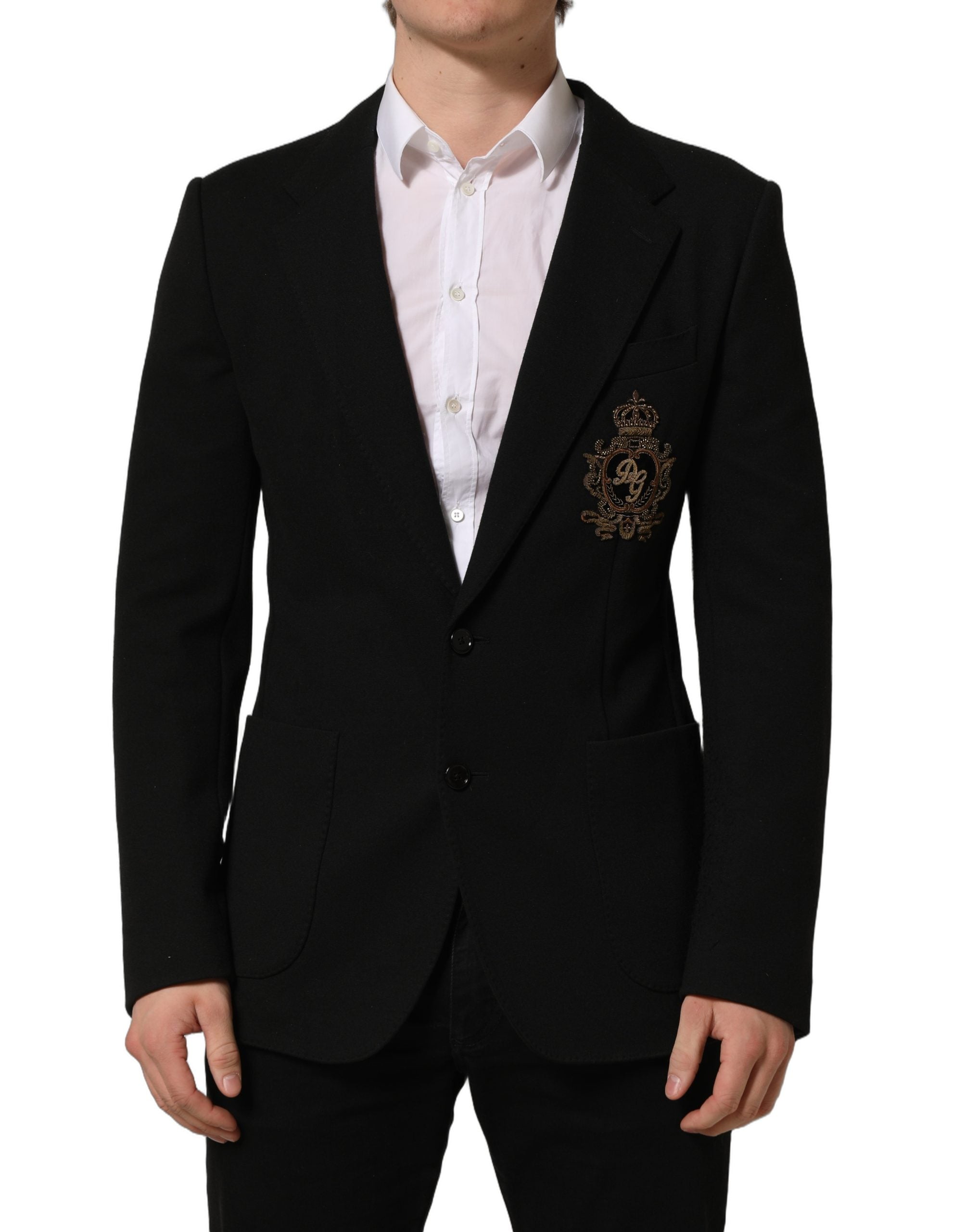 Manteau blazer noir Dolce & Gabbana avec logo crest, simple à un bouton, élégant et classique, en tissu de qualité.
