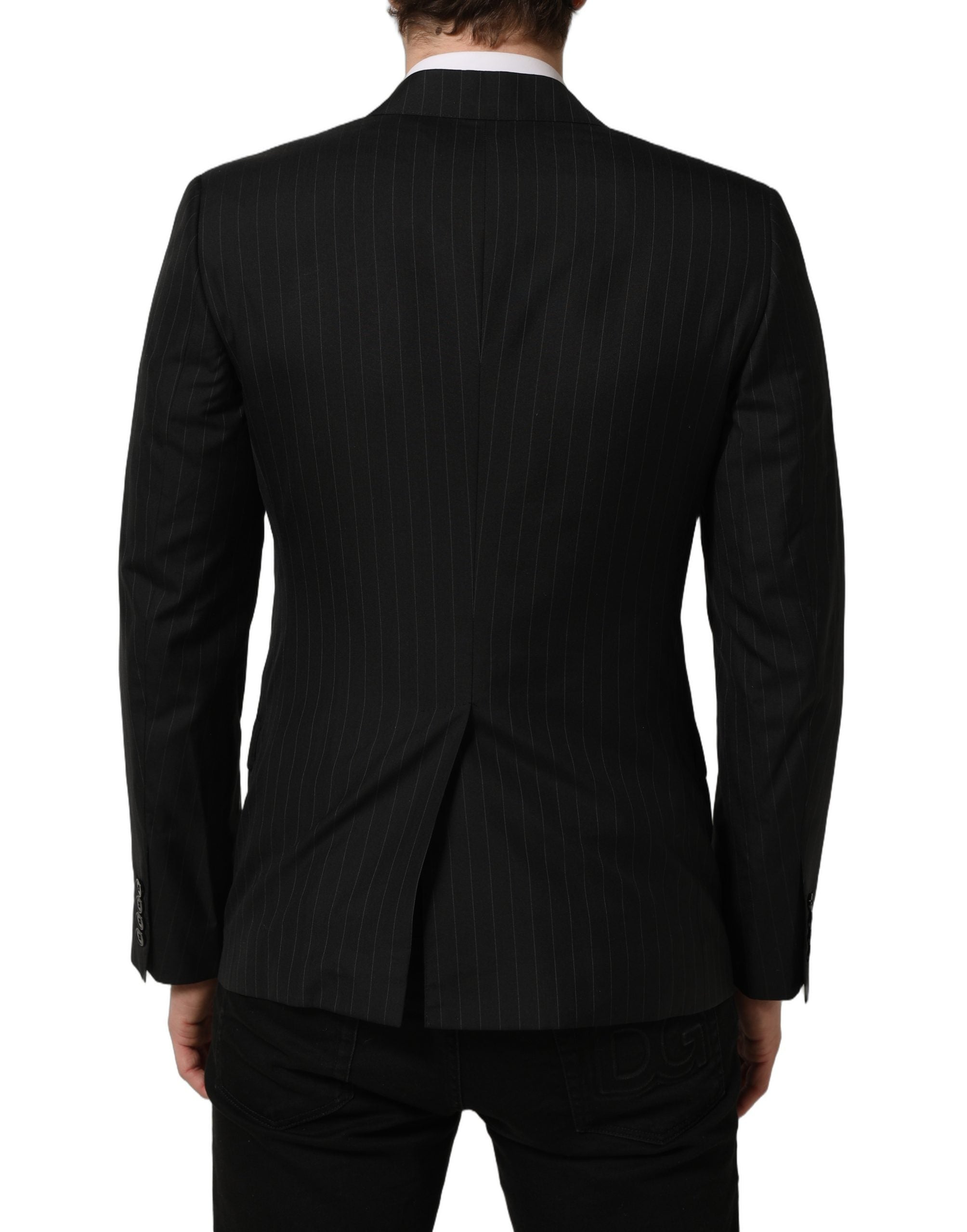 Blazer en laine noir à rayures de Dolce & Gabbana, coupe simple, à boutonnière simple, élégant et sophistiqué.