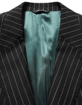 Veste blazer en laine noire à rayures pour homme de Dolce & Gabbana, coupe simple boutonnage simple, élégante et classique.