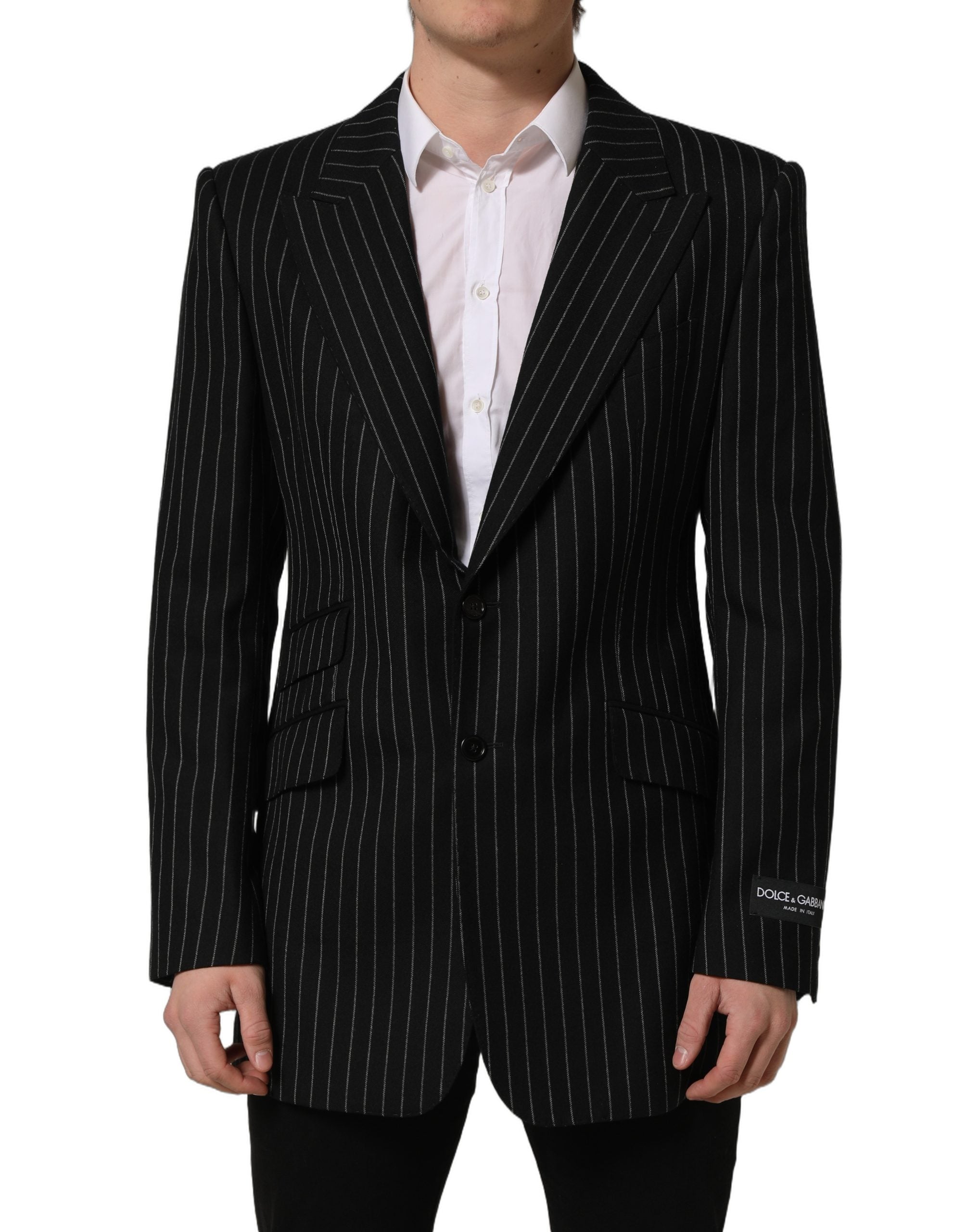 Blazer en laine noir à rayures Dolce & Gabbana, coupe simple, à un seul bouton, avec revers élégants, sur un mannequin.