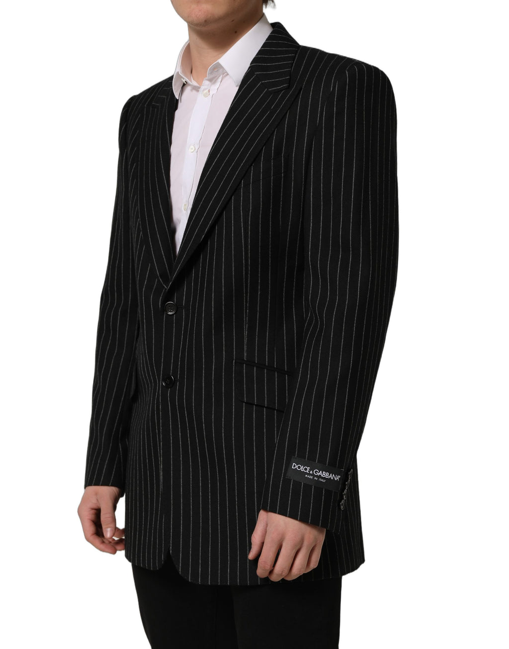 Blazer en laine à rayures noires de Dolce & Gabbana, coupe simple boutonnage, tendance élégante et sophistiquée.