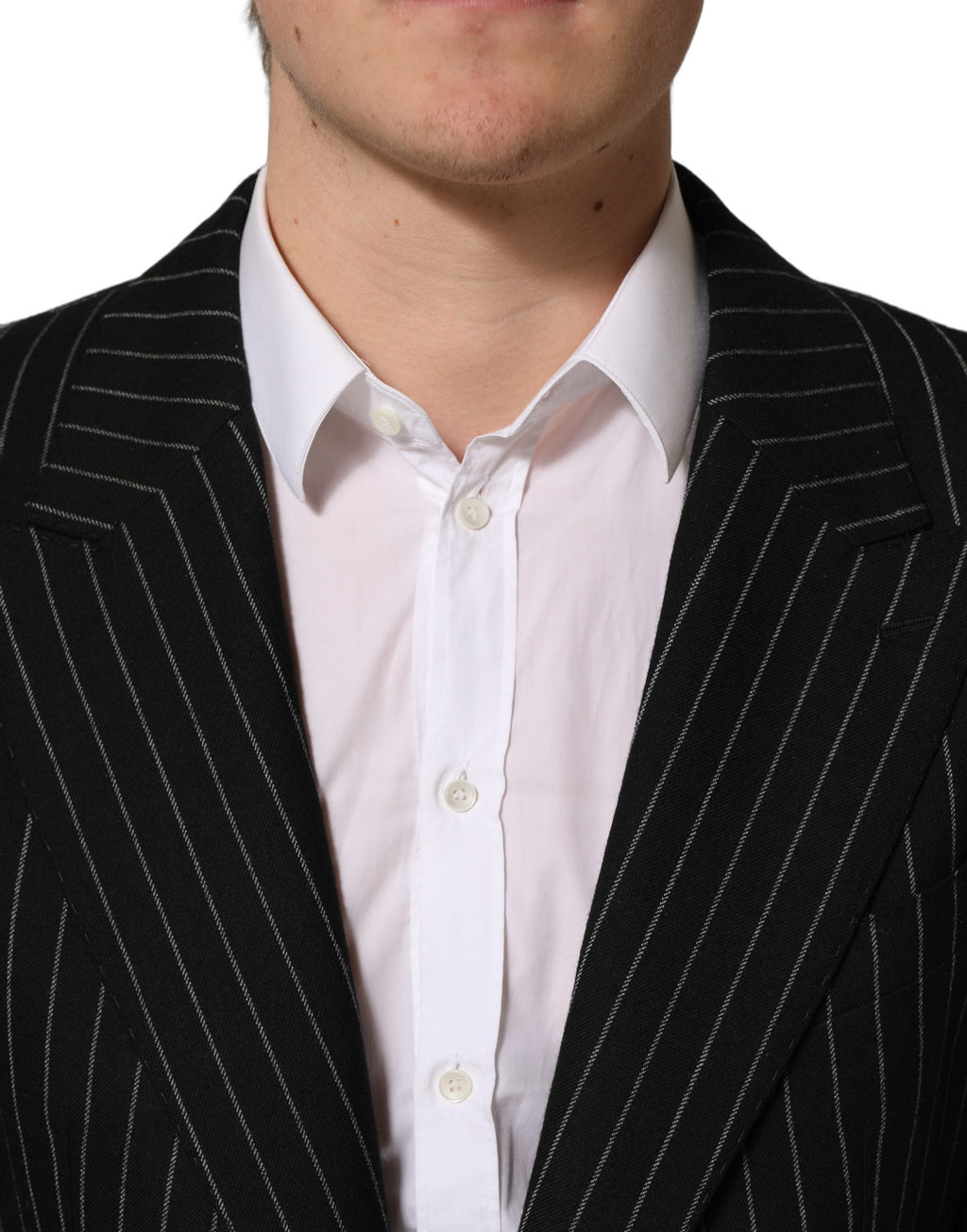 Blazer en laine noir à rayures Dolce & Gabbana, coupe simple boutonnage, détails élégants, porté sur un mannequin.