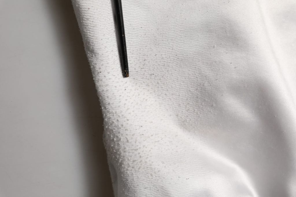 Veste bomber en polyester avec logo DG blanc de Dolce & Gabbana, style moderne et élégant, visible sur l'image.