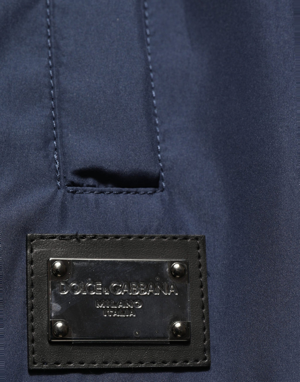 Pantalon de jogging en polyester bleu foncé Dolce & Gabbana, style décontracté avec ceinture élastique et poches latérales.