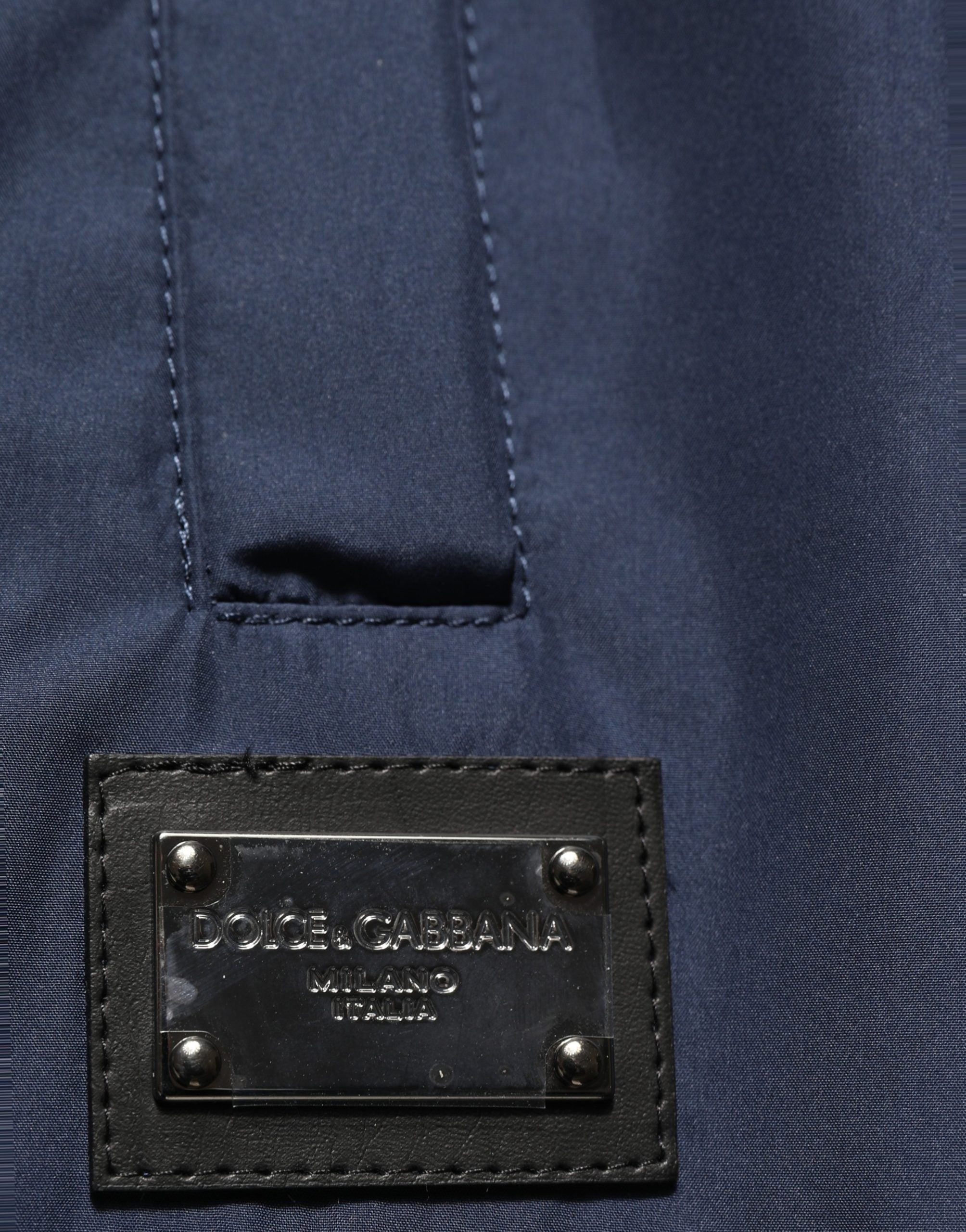 Pantalon de jogging en polyester bleu foncé Dolce & Gabbana, style décontracté avec ceinture élastique et poches latérales.