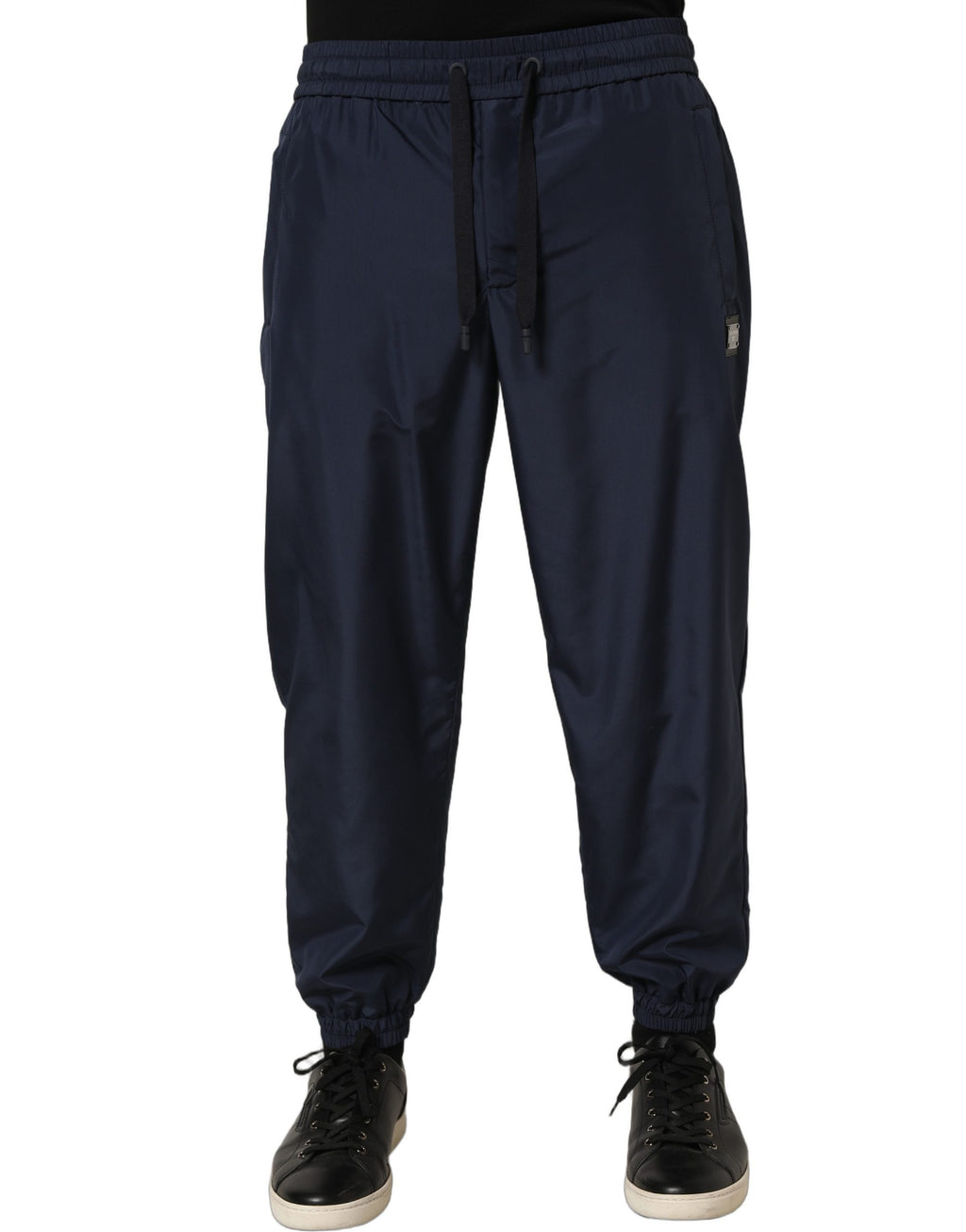 Pantalon de jogging en polyester bleu foncé Dolce & Gabbana, pantalon décontracté pour homme avec poches et taille élastique.