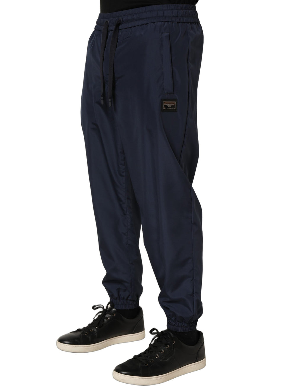 Pantalon de jogging en polyester bleu foncé Dolce & Gabbana, style décontracté avec taille élastique et poches latérales.