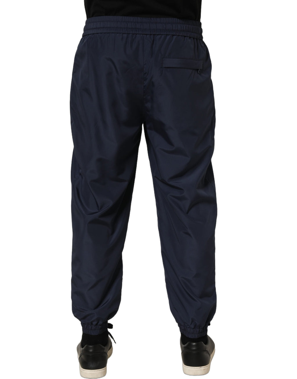 Pantalons de jogging en polyester bleu foncé de Dolce & Gabbana, style décontracté avec ceinture élastique et poches latérales.