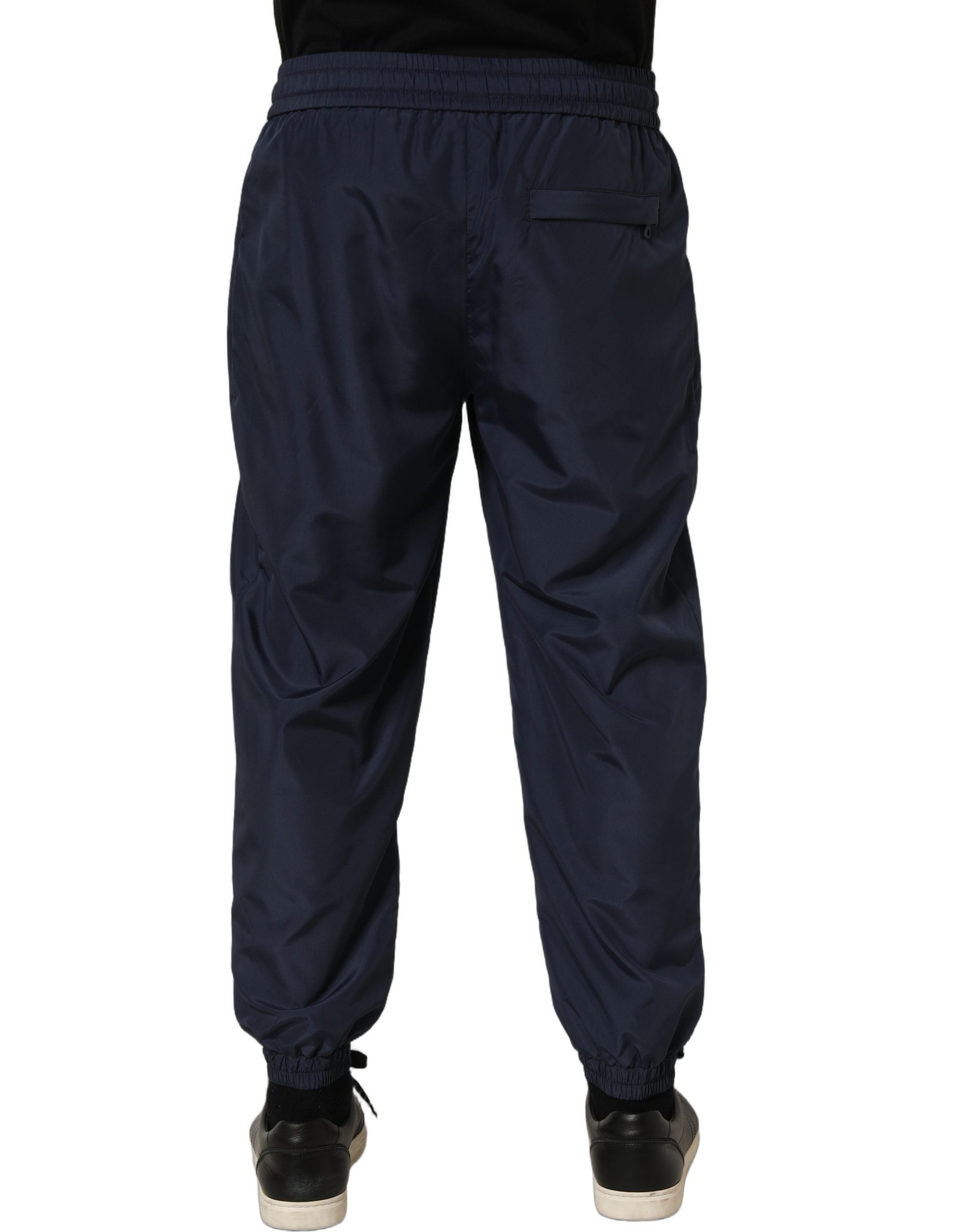 Pantalons de jogging en polyester bleu foncé de Dolce & Gabbana, style décontracté avec ceinture élastique et poches latérales.
