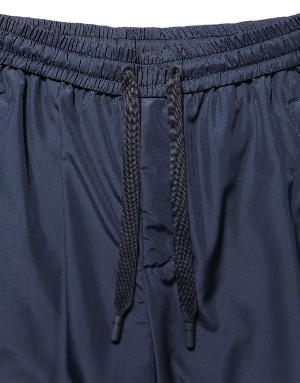 Pantalon jogging en polyester bleu foncé de Dolce & Gabbana, pantalon décontracté pour homme, avec taille élastique et poches latérales.