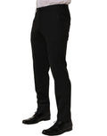 Pantalon homme Dolce & Gabbana en laine noire, coupe skinny, pantalon élégant et ajusté pour hommes.