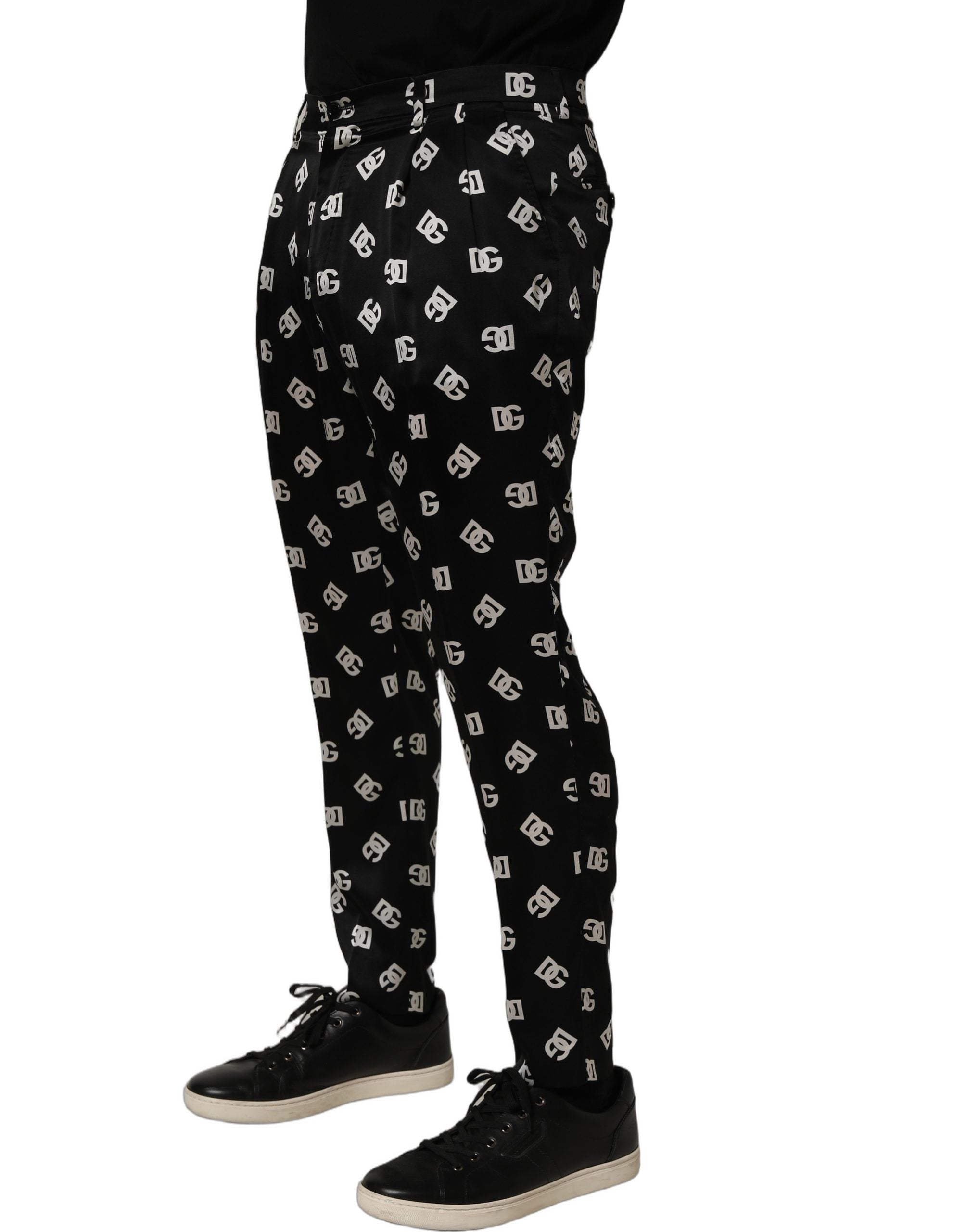 Pantalon homme Dolce & Gabbana en soie noire, coupe skinny, style pantalon élégant avec ceinture.