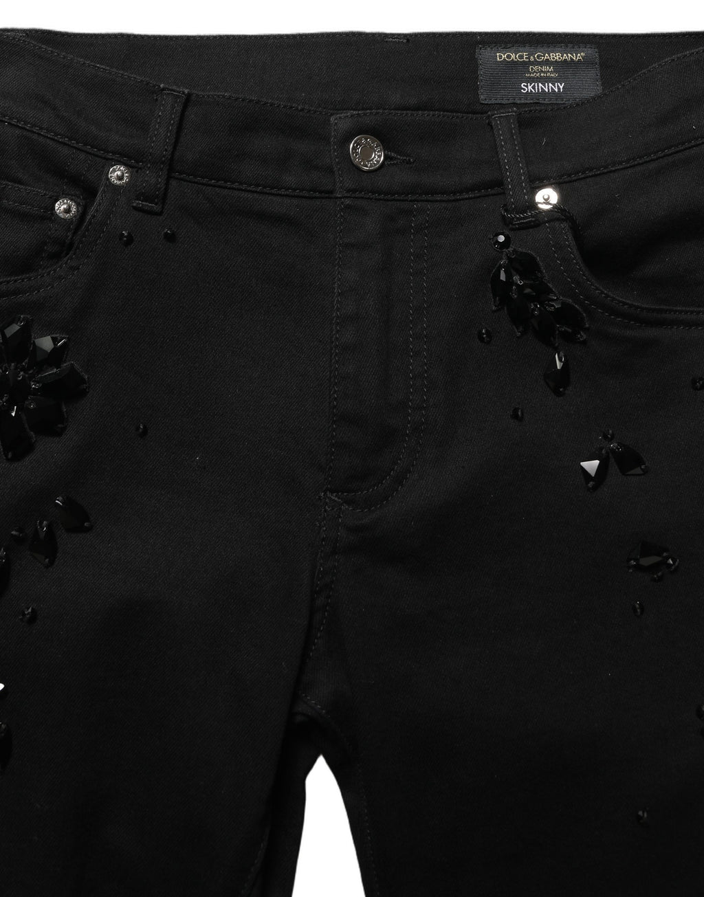 Jeans skinny en denim noir Dolce & Gabbana avec embellissements en coton, visibles avec détails de broderies et finition élégante.