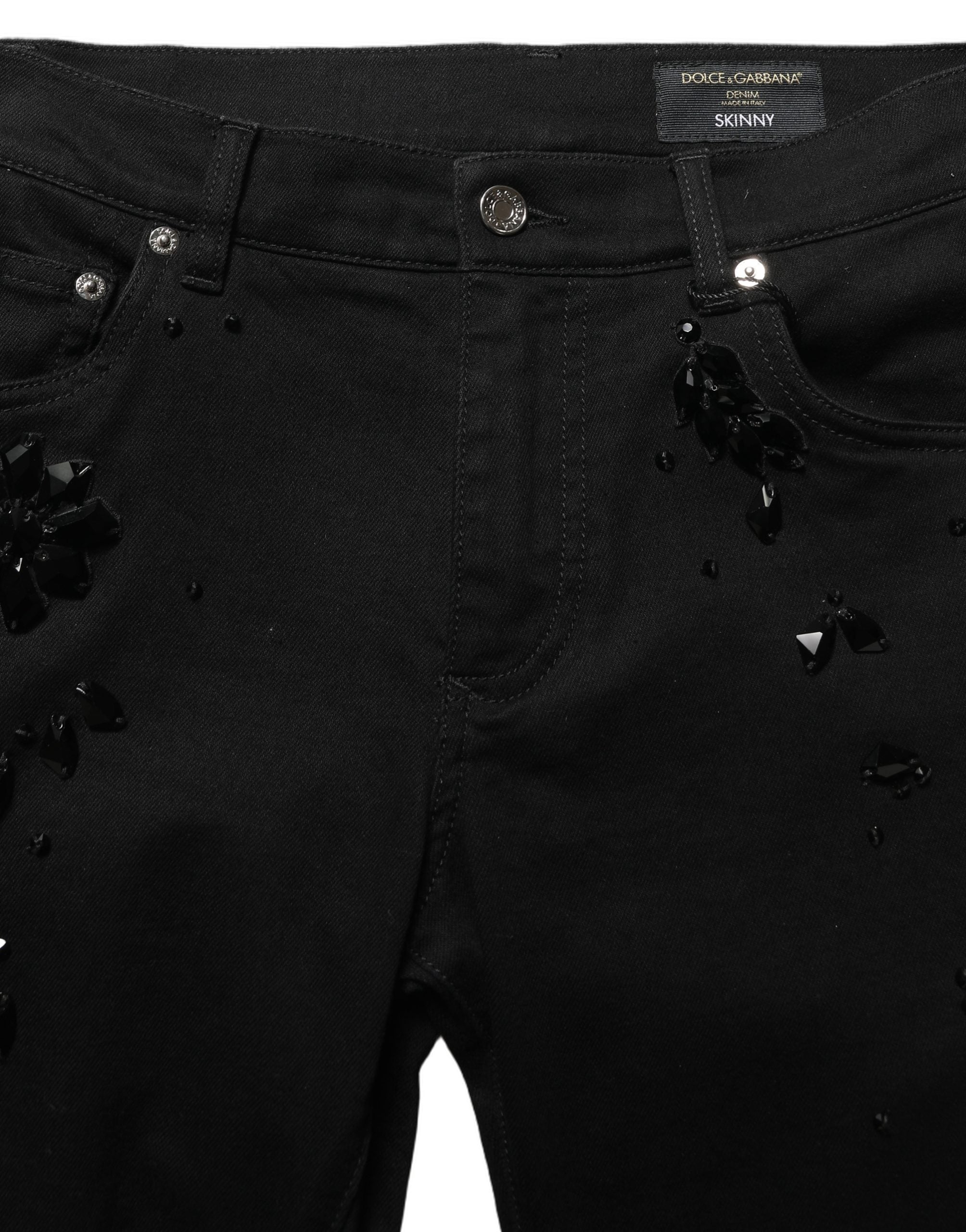 Jeans skinny en denim noir Dolce & Gabbana avec embellissements en coton, visibles avec détails de broderies et finition élégante.