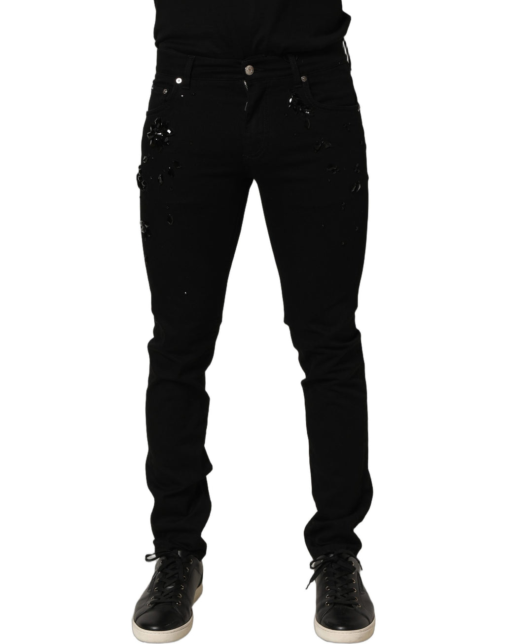 Jeans skinny en denim noir Dolce & Gabbana avec embellissements en coton, visible détails et finition élégante.